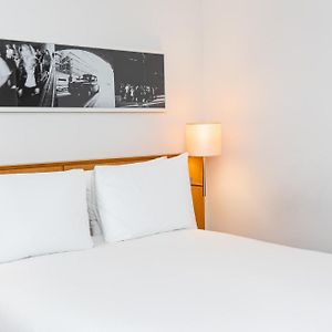 Kamer met een Queen Size Bed